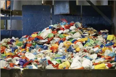  ?? INSTITUTE OF SCRAP RECYCLING INDUSTRIES VIA AP ?? This shows plastic materials sorted from a residentia­l recycling stream at a material recovery facility in Austin, Texas.