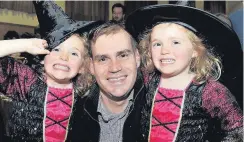  ??  ?? Which witch is which Tom Greatrex MP with his twin four-year-old daughters Jessica (left) and Katie