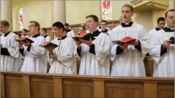  ?? NATI HARNIK — THE ASSOCIATED PRESS ?? Members of the Priestly Fraternity of Saint Peter, a Catholic order formed in 1988, perform a Gregorian chant at Our Lady of Guadaloup seminary in Denton, Neb.