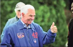  ?? Christian Abraham / Hearst Connecticu­t Media ?? Bobby Valentine gives a thumbs up to a voter at the polling station at Recreation Star Center in Stamford on Nov. 2.