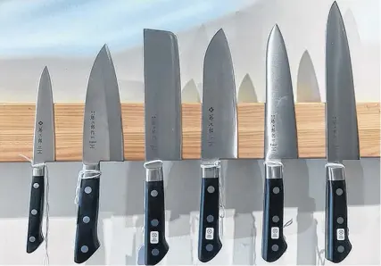  ?? PHOTOS CONTRIBUTE­D ?? The Larch Wood store in Wolfville carries more than half a dozen lines of handmade Japanese knives, including Miyabi, Sugimori, Fujimoto, Fuiwara, Toijio, Tadafusa and Hayukui. Customers can test the knives in the store on the end grain countertop.