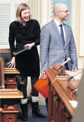  ?? JACQUES BOISSINOT / THE CANADIAN PRESS ?? Quebec Solidaire MNAS Catherine Dorion and Sol Zanetti have been at the vanguard of an assault on traditiona­l attire in the Quebec legislatur­e.