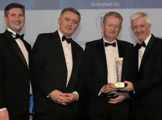  ??  ?? Michael Cosgrave, Patron of DIT Doctorate, second right, presents the Property Conservati­on Project Award to, from left, Brian Kavanagh, Fergal Ryan and Maurice Blake of Kavanagh Tuite