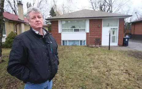  ?? VINCE TALOTTA/TORONTO STAR ?? Ron Shields stands in front of the home at 77 Mossbank Dr. his parents are renting out to Nina Willis.