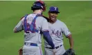  ?? Photograph: Kevin M Cox/UPI/Shuttersto­ck ?? Texas Rangers relief pitcher Jose Leclerc is congratula­ted by catcher Jonah Heim.