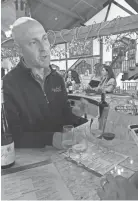  ?? SALLY CARPENTER ?? A server describes the wines during a tasting at Raphael Vineyard &amp; Winery in Peconic, New York. HALE/AP