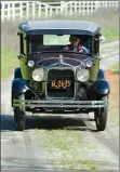  ?? RECORDER PHOTO BY CHIEKO HARA ?? Carson Blaydes drives his 1929 Model A on Wednesday. He will be driving his car to the Central California Regional Group Jamboree at the Portervill­e Fairground­s on Friday and Saturday.