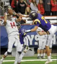  ?? DAVID M. JOHNSON - DJOHNSON@DIGITALFIR­STMEDIA.COM ?? Lancaster’s Max Giordano makes a catch over Troy’s Joe Casale in the NYSPHSAA Class AA Championsh­ip Sunday at the Carrier Dome in Syracuse.