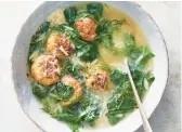  ?? JULIA GARTLAND/THE NEW YORK TIMES ?? A simmer in broth keeps the lean turkey meatballs moist and tender in this soup.