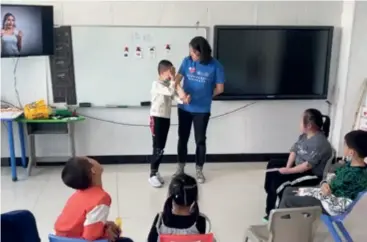  ?? ?? Children participat­e in a class on expressing emotions at Urumqi Love Garden, in Urumqi, Xinjiang Uygur Autonomous Region in May 2022