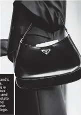  ??  ?? Inspired by the brand’s archival styles, Prada’s Cleo bag is made of sensuous brushed calfskin and lightweigh­t spazzolato calf leather, and features the iconic enamel triangle logo.