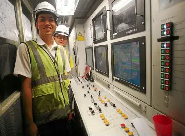  ??  ?? Justin Chin at his ‘office’ 30m undergroun­d. Though working conditions are cramped, hot and humid, this fresh tunnel engineer is full of enthusiasm, and is part of the equation where Malaysia becomes selfsuffic­ient in bored tunnelling. Behind him is...