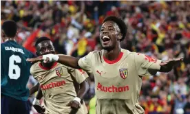  ?? Denis Charlet/AFP/Getty Images ?? Elye Wahi celebrates after making it 2-1 to Lens against Arsenal in France. Photograph: