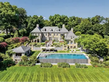  ?? ?? The 11,279-square-foot mansion at 549 Indian Field Road in Greenwich is described as a “waterfront hotel” by its listing.