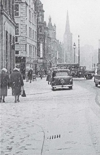  ??  ?? This photograph of Dundee city centre was taken about 58 years after the fruit riot of 1906. The streetscap­e to the left of the picture is unchanged to this day but the Overgate Centre has replaced the old buildings to the right. The bottom photograph shows the other end of High Street and the DM Brown department store.