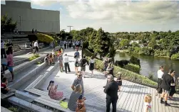  ?? PHOTOS: CHRISTEL YARDLEY/STUFF ?? A few hundred people attended the opening of Victoria on the River last night.