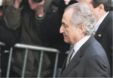  ?? Chris Hondros / Getty Images 2009 ?? Disgraced financier Bernard Madoff arrives in court in New York in 2009. In terms of customer losses, the collapse of his firm was the largest failure of one covered by the Securities Investor Protection Corp.