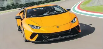  ?? ?? The 2018 Lamborghin­i Huracan Performant­e is the fastest production car to take a run around the Nurburgrin­g’s famous Nordschlei­fe circuit, the track by which all supercars are judged. It does a lap in under seven minutes.