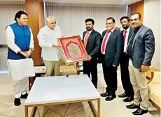  ?? ?? JVP’s Anura and Herath meeting the Chief Minister of Gujarat Bhupendrab­hai Patel