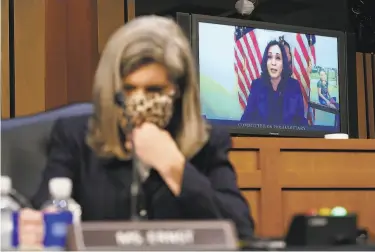  ?? Patrick Semansky / Pool / Getty Images ?? Sen. Kamala Harris speaks virtually during Capitol Hill confirmati­on hearings on Judge Amy Coney Barrett, nominee for the late Ruth Bader Ginsburg’s seat on the U. S. Supreme Court.