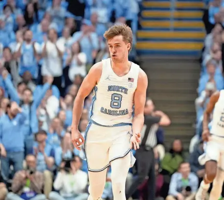  ?? BOB DONNAN/USA TODAY SPORTS ?? North Carolina guard Paxson Wojcik will be going against his father Doug, a Michigan State assistant coach, when the two teams meet on Saturday.