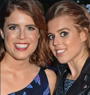  ??  ?? Hard work: Princesses Eugenie, left, and Beatrice