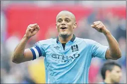  ??  ?? Manchester City’s Belgian defender Vincent Kompany celebrates after winning the FA Cup semifinal football match between Chelsea and Manchester City at Wembley Stadium in
north London on April 14. Manchester City won 2-1. (AFP)