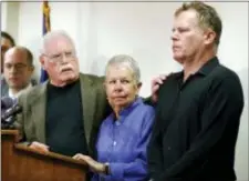  ?? STEVE HELBER - THE ASSOCIATED PRESS ?? John Lyon and his wife, Mary, right, parents of Sheila and Katherine Lyon, introduce their son, Joe, after a plea by Lloyd Lee Welch Jr., for the killings of the young sisters in 1975, in Bedford County Circuit Court in Bedford, Va., Tuesday. Welch...