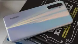  ??  ?? The Realme 6’s rear has a striking design that comes to life as you move the phone around