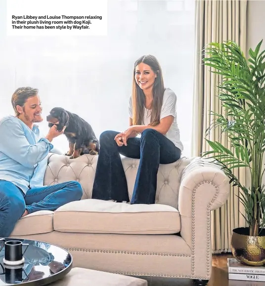  ?? ?? Ryan Libbey and Louise Thompson relaxing in their plush living room with dog Koji. Their home has been style by Wayfair.