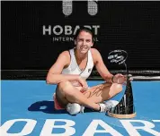  ?? Steve Bell/Getty Images ?? Emma Navarro poses for a photo after winning the Hobart Internatio­nal at Domain Tennis Centre on Saturday in Hobart, Australia.
