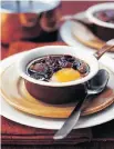  ??  ?? Baked Eggs with Chicken Livers and Shallots in Wine.