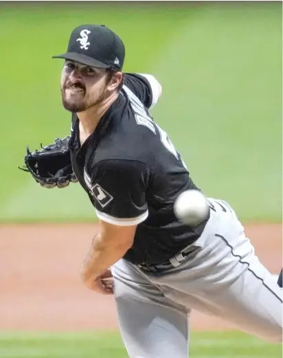  ??  ?? Sox left-hander Carlos Rodon lasted only two innings Monday against the Brewers before departing with a shoulder injury.