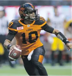  ?? DARRYL DYCK/THE CANADIAN PRESS ?? B.C. Lions quarterbac­k Jonathon Jennings has thrown for at least 300 yards four games in a row.