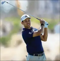  ?? DAVID CANNON / GETTY IMAGES ?? Xander Schauffele, 26, plays a shot during the first round of the Hero World Challenge on Dec. 4 in the Bahamas. Since June 2017, Schauffele has gone from relative obscurity to four-time PGA Tour winner, top 10 in the world and a member of the U.S. Presidents Cup team.