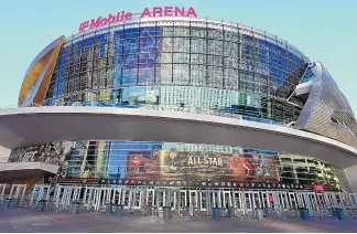  ?? DAVID BECKER/ASSOCIATED PRESS ?? T-Mobile Arena in Las Vegas, pictured in February. A combinatio­n of profession­al sports expansion, lobbying and changing attitudes surroundin­g sports betting led to NCAA Tournament games in ‘Sin City.’