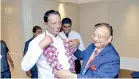  ??  ?? Tourism Developmen­t and Christian Religious Affairs Minister John Amaratunga is welcomed by IATO President Pranab Sarkar