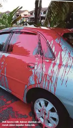  ??  ?? DUA kereta milik Adenan disimbah cat merah dalam kejadian Sabtu lalu.