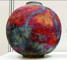  ??  ?? ‘Our weather results in more vibrant colours in the rainbow raku, because the pottery cools more slowly, allowing more time for the colours to develop,’ says Adil.