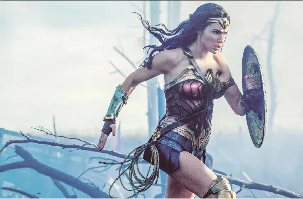  ?? PHOTOS: WARNER BROS. ?? No ’70s hot pants to see here: Gal Gadot plays a somewhat more dangerous Diana — one character admits to being both frightened and aroused — in Wonder Woman.