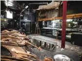  ?? ASHLEE REZIN GARCIA/SUN-TIMES PHOTOS ?? ABOVE: The interior of Lee’s Unleaded Blues at 7401 S. South Chicago Ave. in Grand Crossing, which closed in 2015. LEFT: Warren Berger, owner of Club Escape, purchased the building in 2018 and plans to reopen the popular blues bar in April 2021