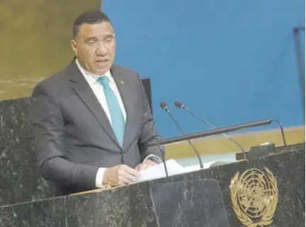  ?? (Photo: AFP) ?? UNITED NATIONS, New York — Jamaica’s Prime Minister Andrew Holness addressing the 77th Session of the United Nations General Assembly at the UN headquarte­rs in New York City on September 22, 2022.