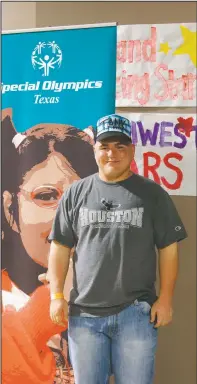  ?? (Courtesy Photo/Gary Schottle) ?? Tank poses in the Athletes Village at the Texas Special Olympics in College Station, Texas, in 2011. “I love to spread love and hope for our country and our world,” Tank said. “We should all love one another and bring hope and inspiratio­n to other people.”