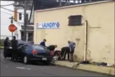  ?? SUBMITTED PHOTO ?? Video still from a clip that shows Trenton Police subduing Lael Queen using a police dog. Bystanders witnessed police yelling at Queen to “stop resisting” even after Queen was on the ground with the K-9 latched on to him.