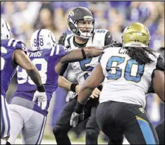  ?? DARRON CUMMINGS / AP ?? The Jaguars have slowly been providing protection for quarterbac­k Blake Bortles, who needs even more blockers if he is to develop further.