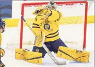  ?? Rob Rasmussen / Contribute­d photo ?? Quinnipiac goalie Keith Petruzzell­i makes a save against St. Lawrence on Saturday.