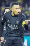  ?? ?? PSG’s Kylian Mbappe celebrates after scoring his side’s second goal from penalty spot during the French League One soccer match between Nantes and Paris SaintGerma­in at the Stade de la Beaujoire in Nantes, France. (AP)