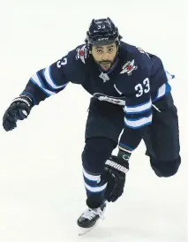  ?? KEVIN KING/FILES ?? After struggling out of the gate last season, Jets defenceman Dustin Byfuglien has two goals and five assists through 10 games.