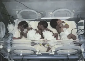  ?? AP PHOTO/FATIMA SHBAIR ?? Babies are seen in an incubator at the preemie ward of the Emirati Hospital in Rafah, Gaza Strip, on Friday.