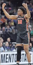  ?? USA Today Sports - Kelley L Cox ?? Princeton forward Keeshawn Kellman tries to spark the crowd in the second half of the 15th-seeded Tigers’ upset victory over second-seeded Arizona on Thursday.